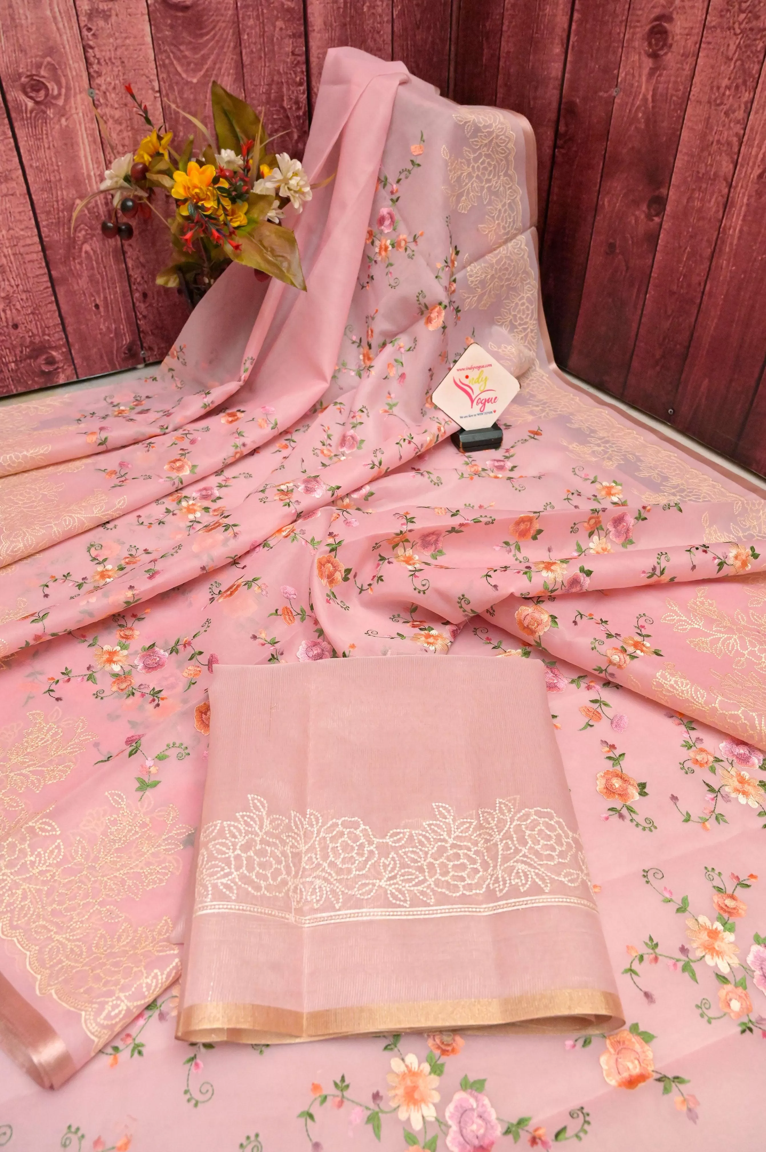 Pale Salmon Orange Color Organza Saree with Machine Embroidery